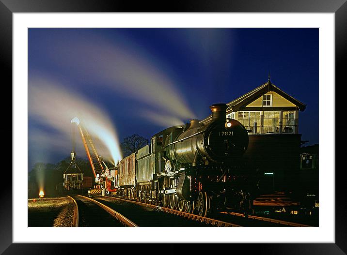 Re-railing a truck by night  Framed Mounted Print by Ian Duffield