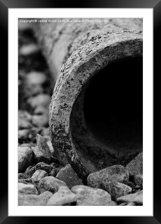Pipe and pebbles Framed Mounted Print by James Wood