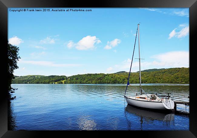 A yacht lies anchored on Windermere Framed Print by Frank Irwin