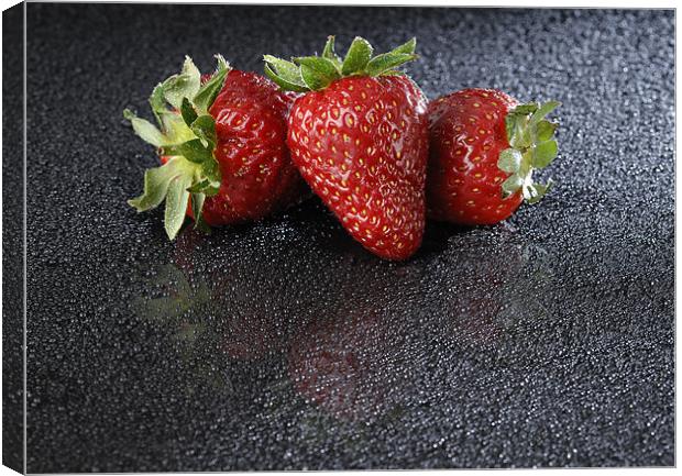 Strawberies over black Canvas Print by Josep M Peñalver