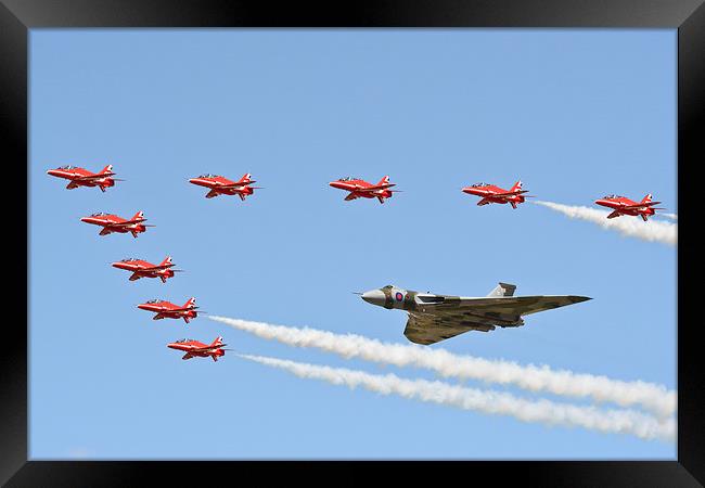 XH558 with The Reds Arrows Framed Print by J Biggadike