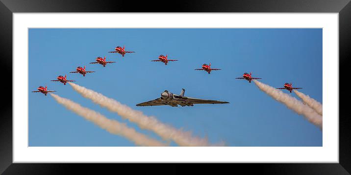  Avro Vulcan XH558 and the Red Arrows perform a fi Framed Mounted Print by stuart bennett