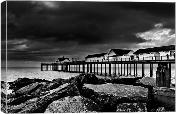 Southwold Pier on a Stormy Day Canvas Print by Paul Macro