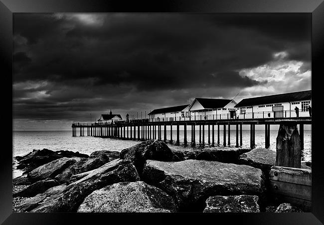 Southwold Pier on a Stormy Day Framed Print by Paul Macro