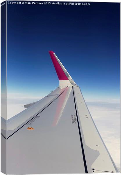 Airplane Window Seat View Over Wing Whilst Flying Canvas Print by Mark Purches