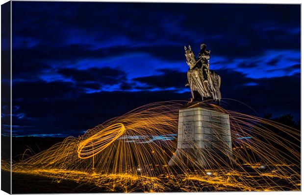 flaming statues Canvas Print by Garry Quinn