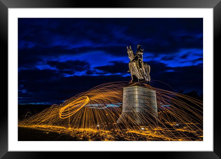 flaming statues Framed Mounted Print by Garry Quinn