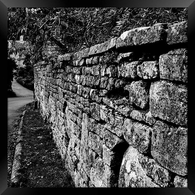 Another brick in the wall Framed Print by Claire Castelli