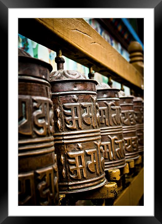 Tibetan Buddhist prayer wheels of Boudhanath stupa Framed Mounted Print by Julian Bound