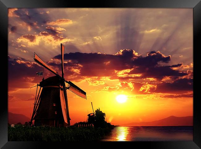 Sunrise beams over the dutch windmills Framed Print by Ankor Light
