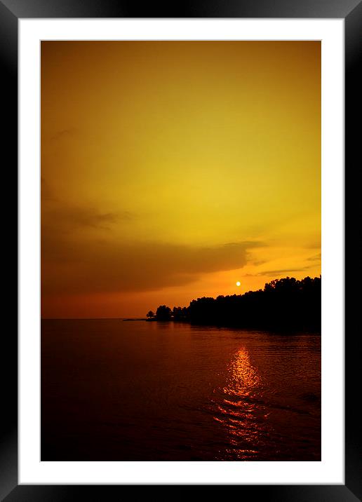 Sunset in Carlita, Indonesia Framed Mounted Print by Julian Bound