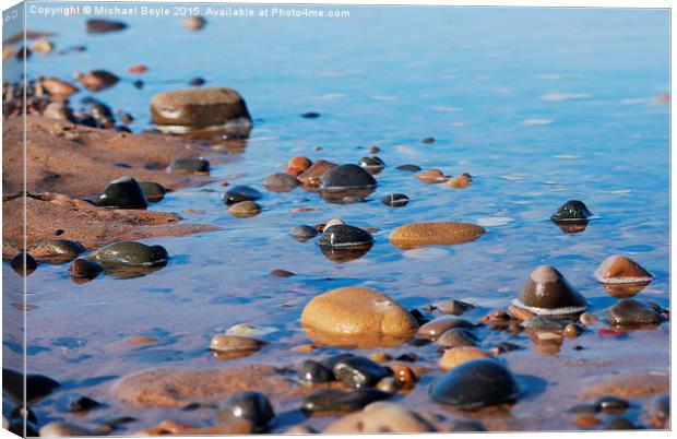  Rocks on the beach Canvas Print by Michael Boyle