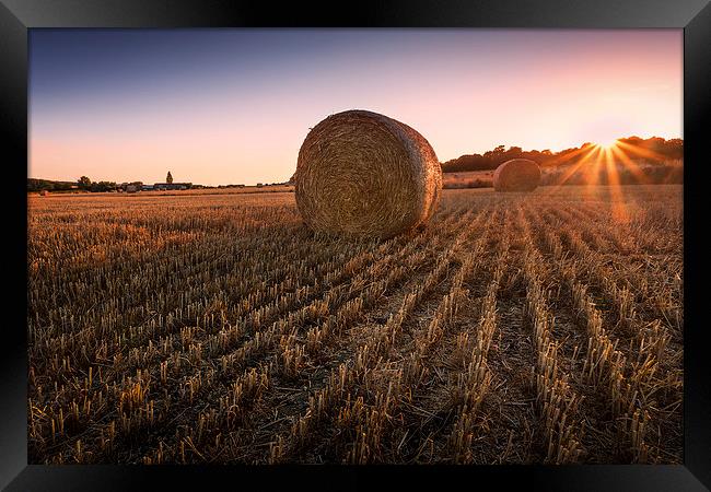  Hay bales at Sunset Framed Print by Ian Hufton
