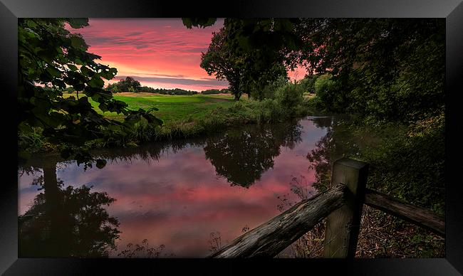 Sunset over the River Mole in Surrey  Framed Print by Colin Evans