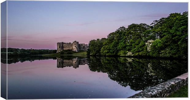  Evening glow over Carew Castle Canvas Print by Mandy Llewellyn