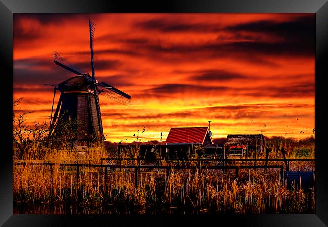Sunrise beams over the dutch windmills Framed Print by Ankor Light