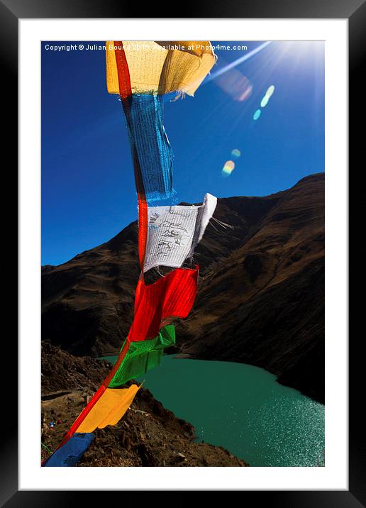 The Yamdrok Lake of Tibet with prayer flags Framed Mounted Print by Julian Bound