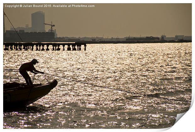 Boat and sailor, the marina of Jakarta, Indonesia Print by Julian Bound