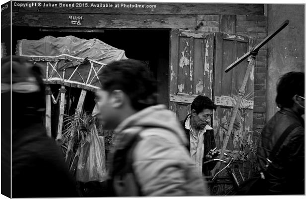  Rickshaw driver, Kathmandu, Nepal Canvas Print by Julian Bound