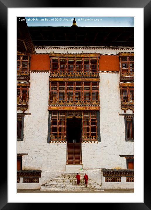 Two monks of Tashi Chho Dzong Fortress, Bhutan Framed Mounted Print by Julian Bound