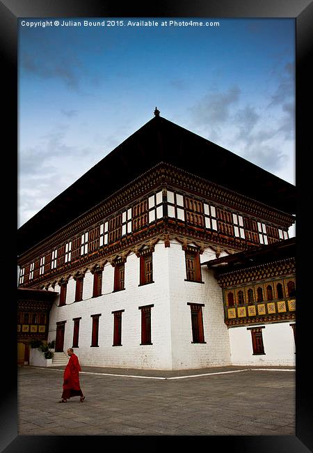 Buddhist Monk of Tashi Chho Dzong Fortress, Bhutan Framed Print by Julian Bound