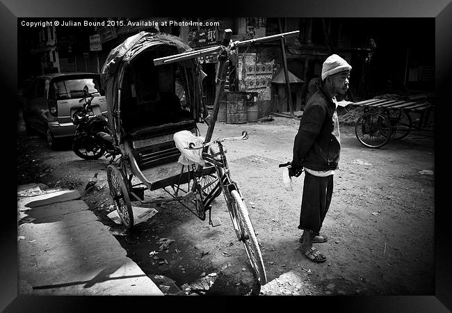   Rickshaw driver, Kathmandu, Nepal Framed Print by Julian Bound