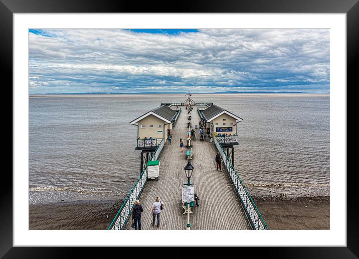Looking Down The Pier 1 Framed Mounted Print by Steve Purnell