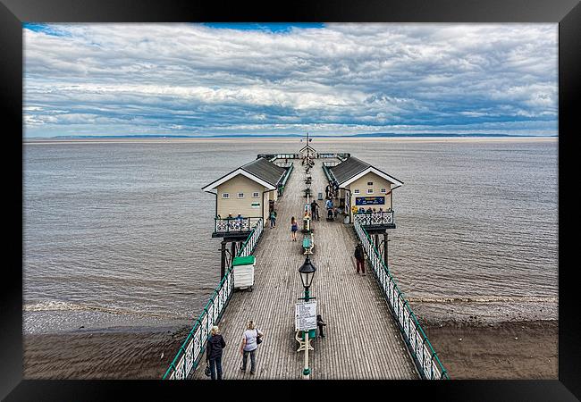Looking Down The Pier 1 Framed Print by Steve Purnell