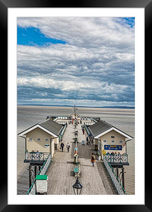 Looking Down The Pier 3 Framed Mounted Print by Steve Purnell