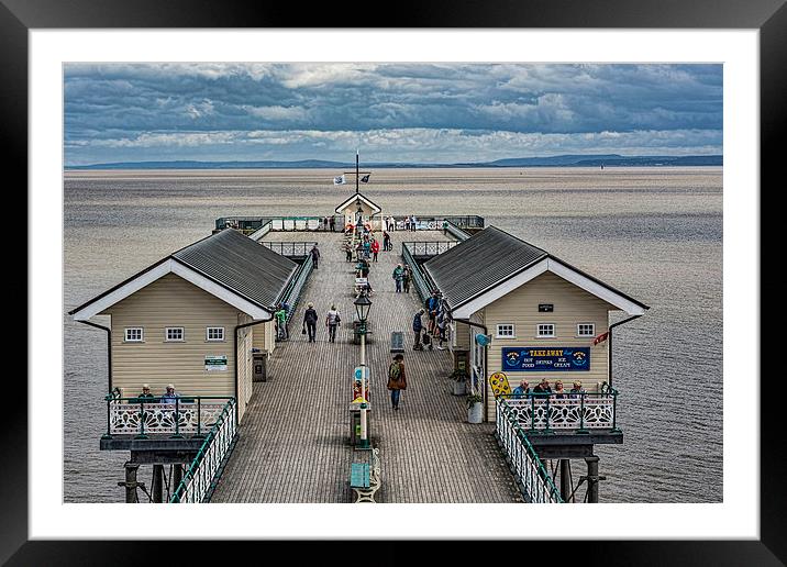 Looking Down The Pier 4 Framed Mounted Print by Steve Purnell