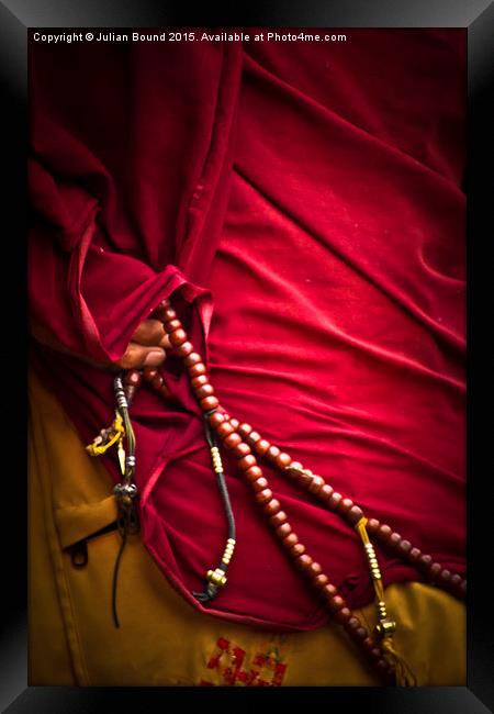 Tibetan monk and beads, Boudhanath Temple, Kathman Framed Print by Julian Bound