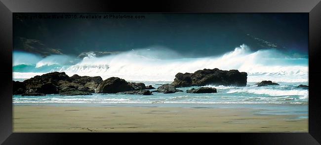  Surfing waves at Porthtowan Framed Print by Liz Ward