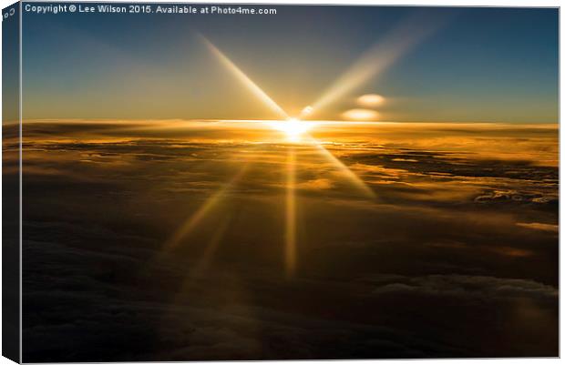 Sunset Above the Clouds Canvas Print by Lee Wilson