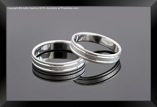 Two silver wedding rings Framed Print by Arletta Cwalina