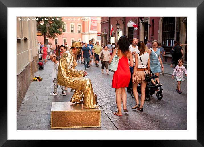 Levitating golden dressed man Framed Mounted Print by Arletta Cwalina