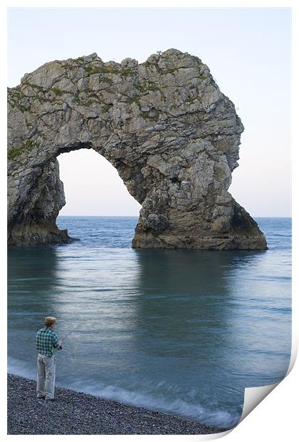 Man fishing at Durdle Door near Lulworth cove. Print by Ian Middleton