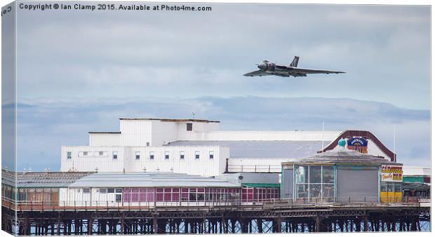  Vulcan over the pier Canvas Print by Ian Clamp