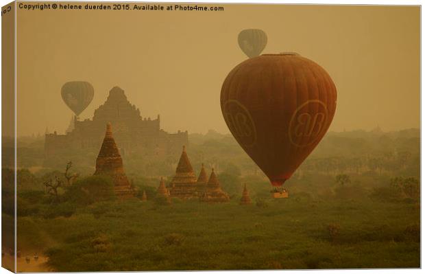  Balloon over Bagan Canvas Print by helene duerden