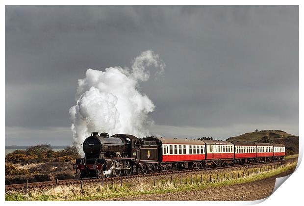 Steam train under storm clouds by the Coast Print by Ian Duffield