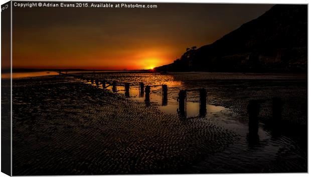 Sunset By The Beach Deganwy Canvas Print by Adrian Evans