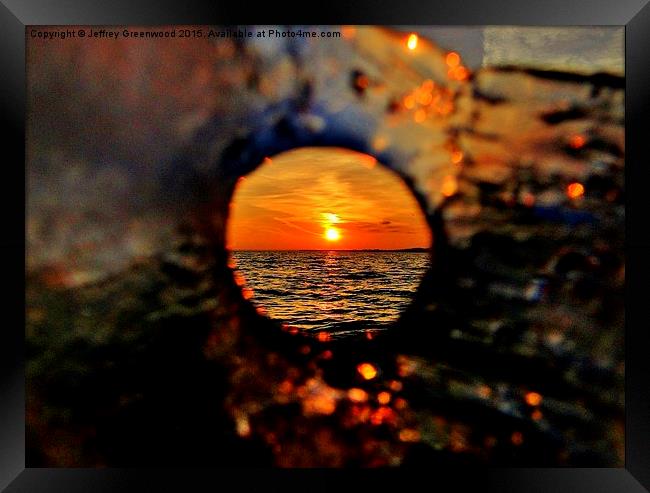 The hole in the ice Framed Print by Jeffrey Greenwood