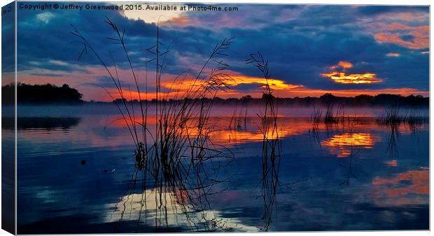  Blue sunrise with reeds Canvas Print by Jeffrey Greenwood