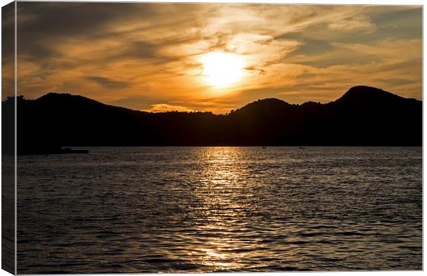 Sunset Over Kolocep Island Canvas Print by Roger Green