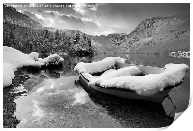 Snow covered boat on Lake Bohinj in Winter Print by Ian Middleton