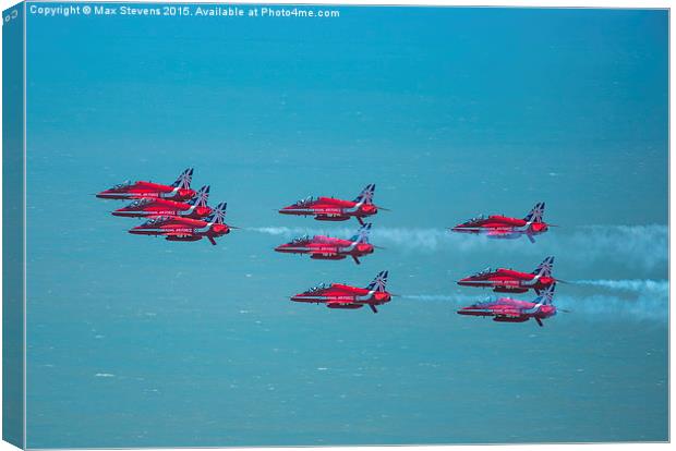  Red Arrows formation low over the sea Canvas Print by Max Stevens