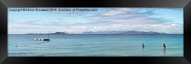 Panorama of Pontoon and Fuerteventura Framed Print by Adrian Brockwell