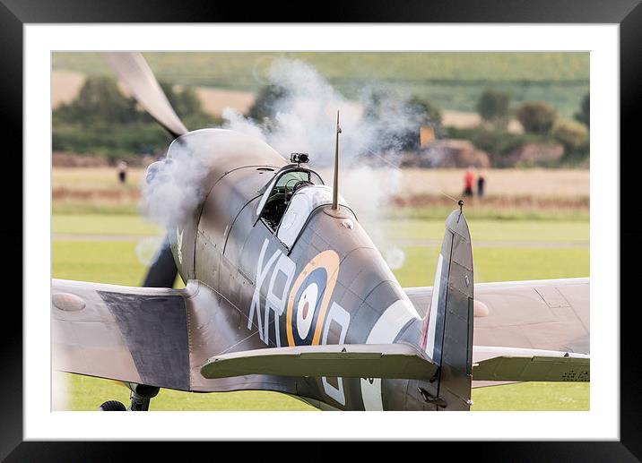 Spitfire engine blowing smoke rings Framed Mounted Print by Gary Eason