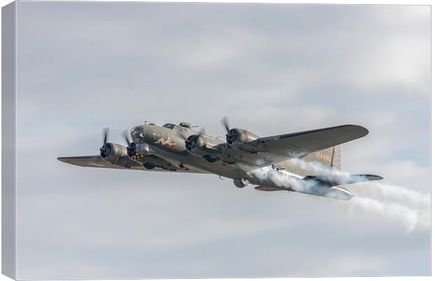 Flying Fortress Sally B's smoke tribute Canvas Print by Gary Eason