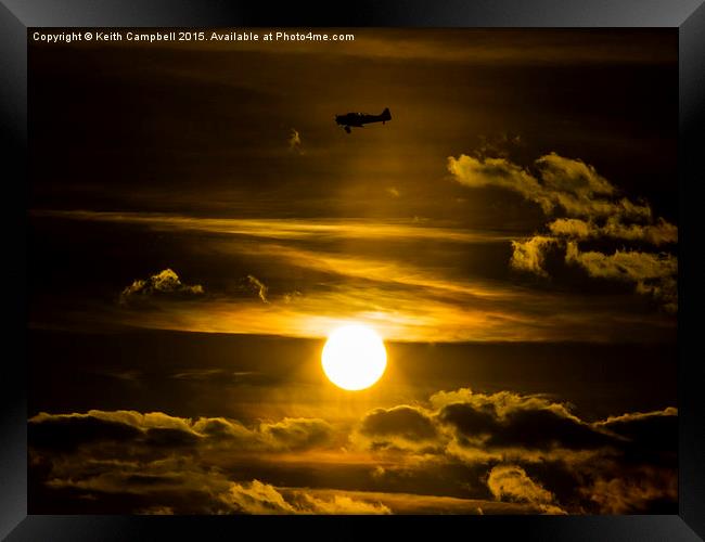  North American Harvard G-BJST passing the sun Framed Print by Keith Campbell