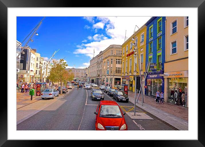  A high street in Cork City Ireland Framed Mounted Print by Sue Bottomley